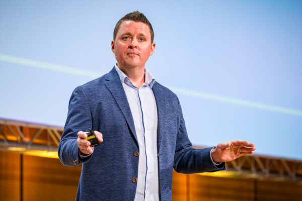 Ryan Cunningham speaking on the main stage at EPPC25