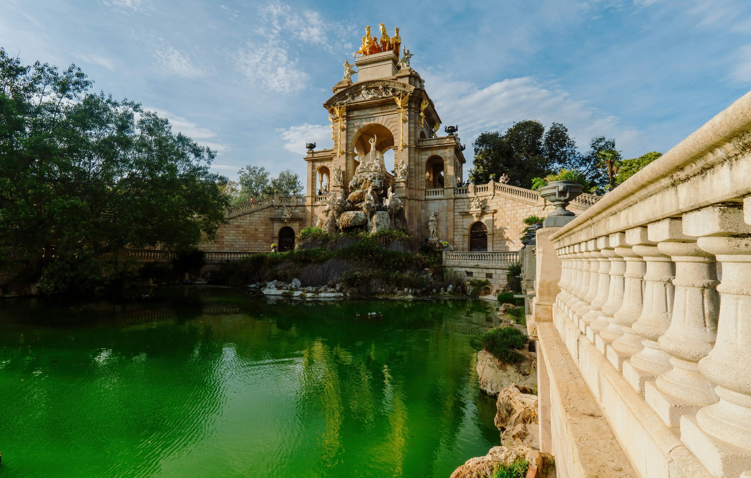 Relax in Ciutadella Park Green water and old statues