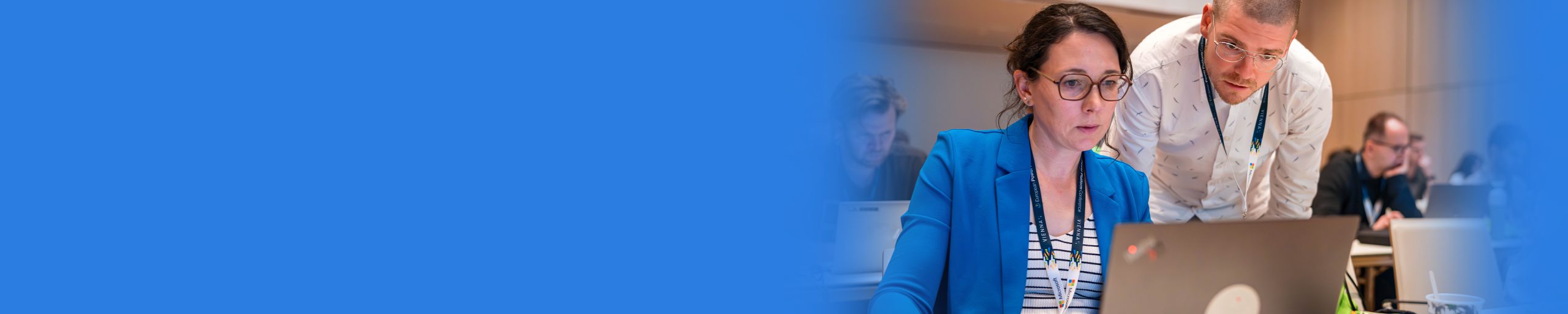 Attendees Looking at Laptop