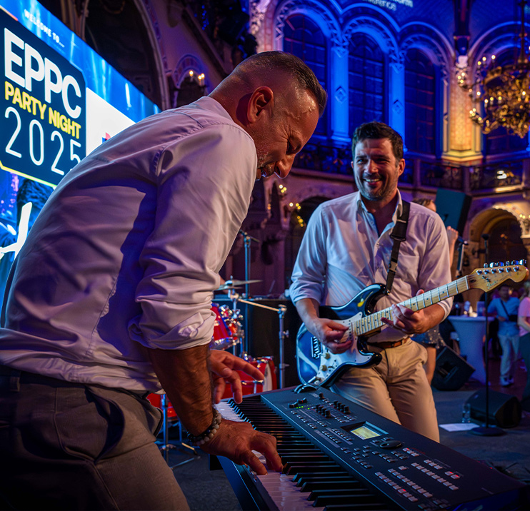 Musicians in a band playing instruments at the EPPC Party Night
